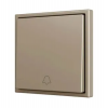 Zennio ZS701PB1DC ZS70, накладка Простая  кнопка для 1 двоичного входа 70x70 мм – Возможность гравировки Значок дверного звонка – шампань арт. ZS701PB1DC